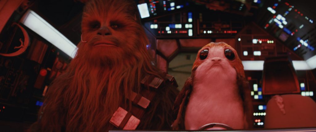 Chewbacca (Joonas Suotamo) and a Porg.