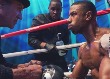 Rocky Balboa is more than just a trainer to Adonis Creed in Creed II. | Credit: Warner Bros Pictures | The Little Binger