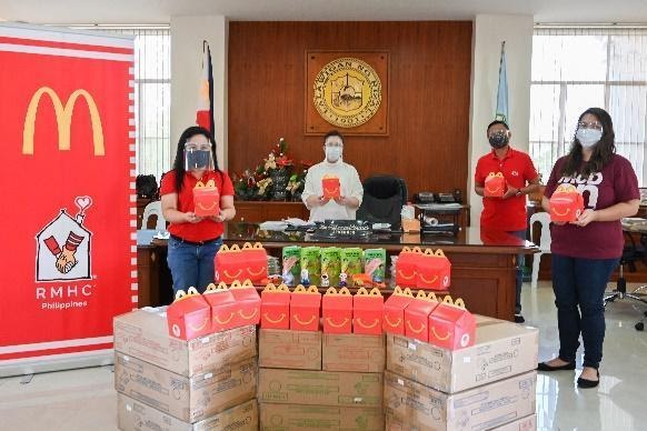 Turnover ceremonies in Rizal (left) and Marikina (right). | Make A Child Happy With Every McDonald's Happy Meal This Holiday | The Little Binger