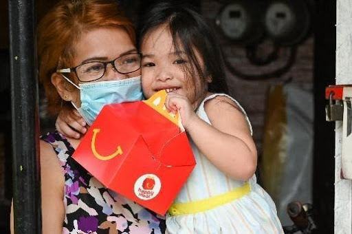 Distribution of books and toys to typhoon-affected areas | Make A Child Happy With Every McDonald's Happy Meal This Holiday | The Little Binger